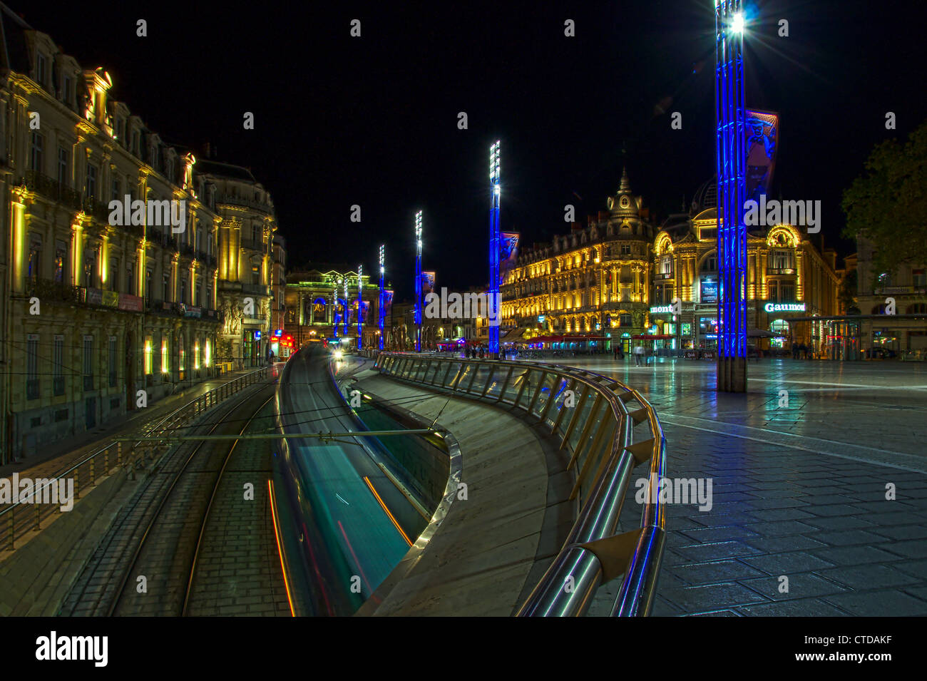 Tram at place de la musique by night Montpellier, france Stock Photo