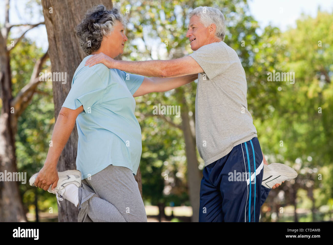 Woman and holding a t shirt hi-res stock photography and images - Alamy