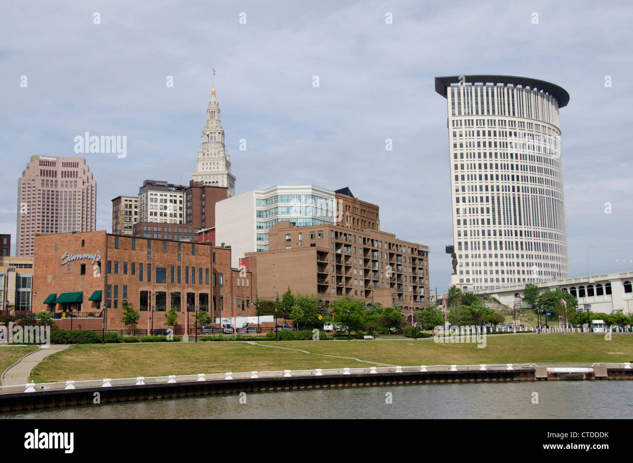 Ohio, Cleveland. Cuyahoga River waterfront with city skyline Stock