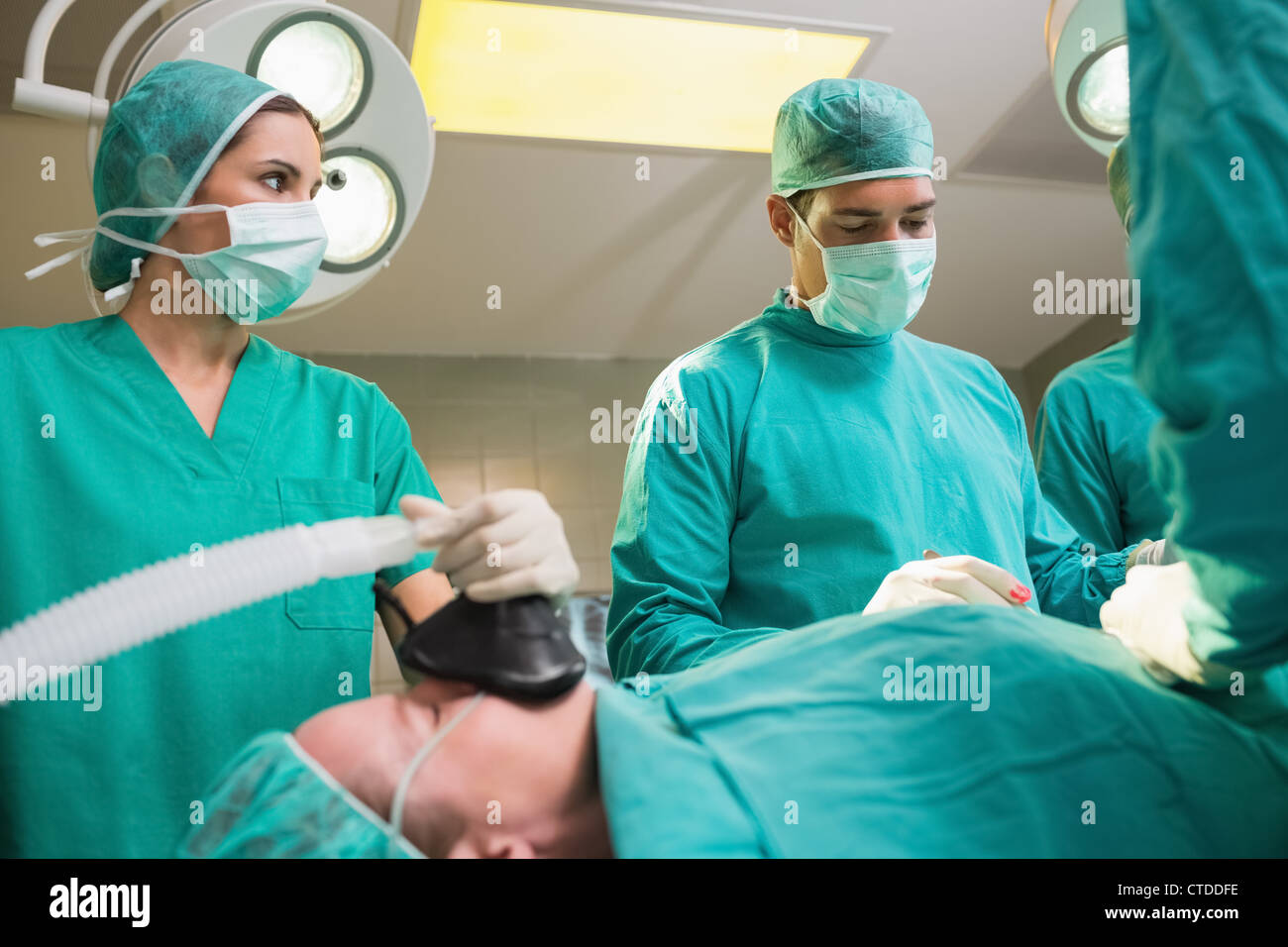 Female nurse holding oxygen mask hi-res stock photography and images ...