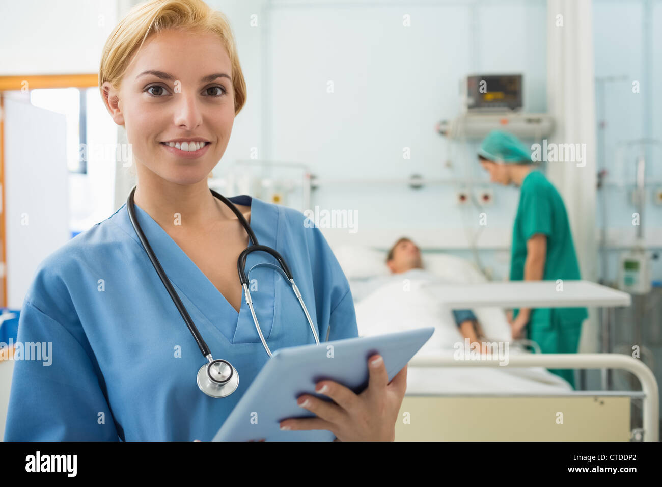 Nurse holding tablet computer hi-res stock photography and images - Alamy