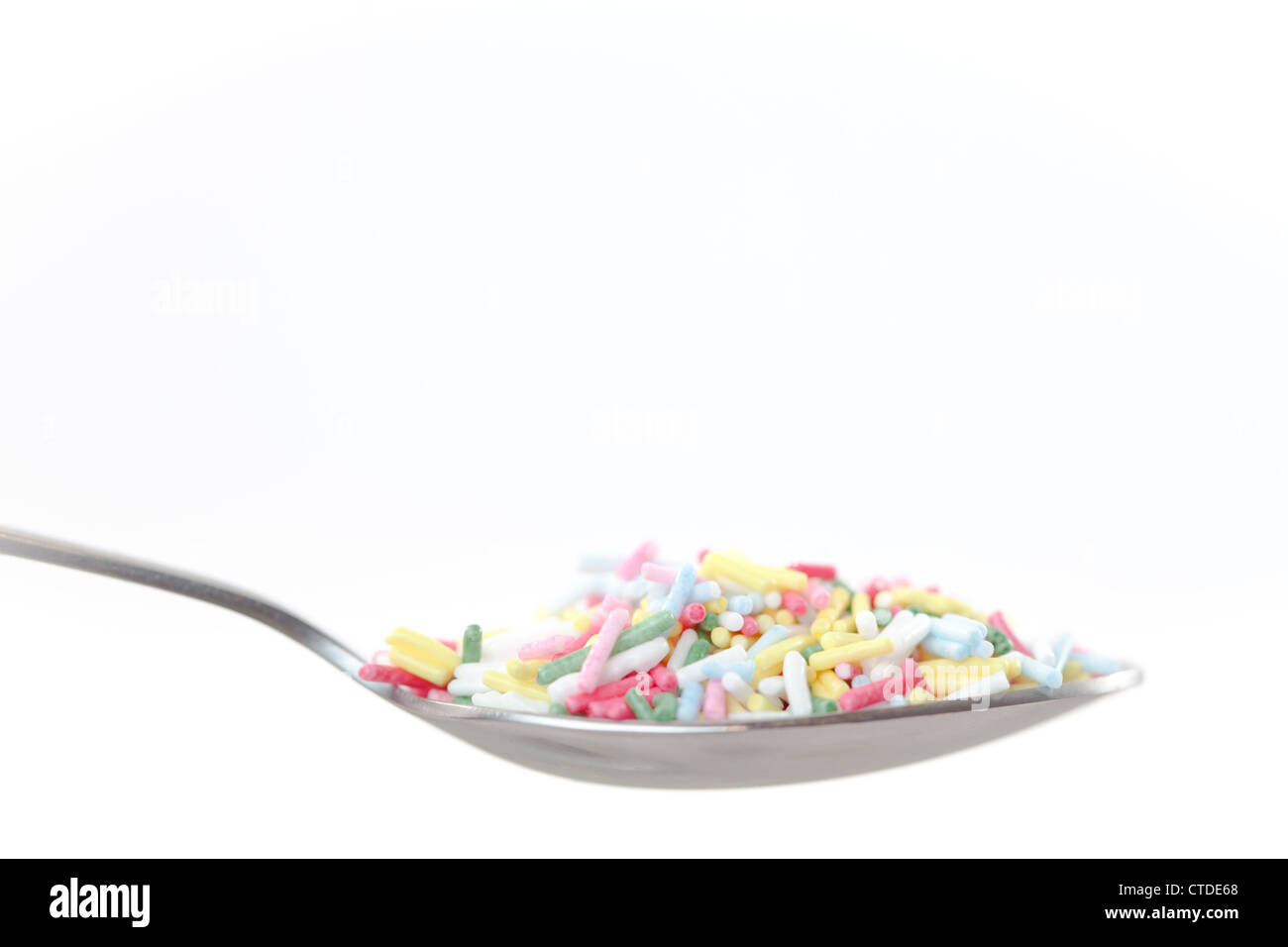 Multicolored sprinkles on the spoon Stock Photo Alamy