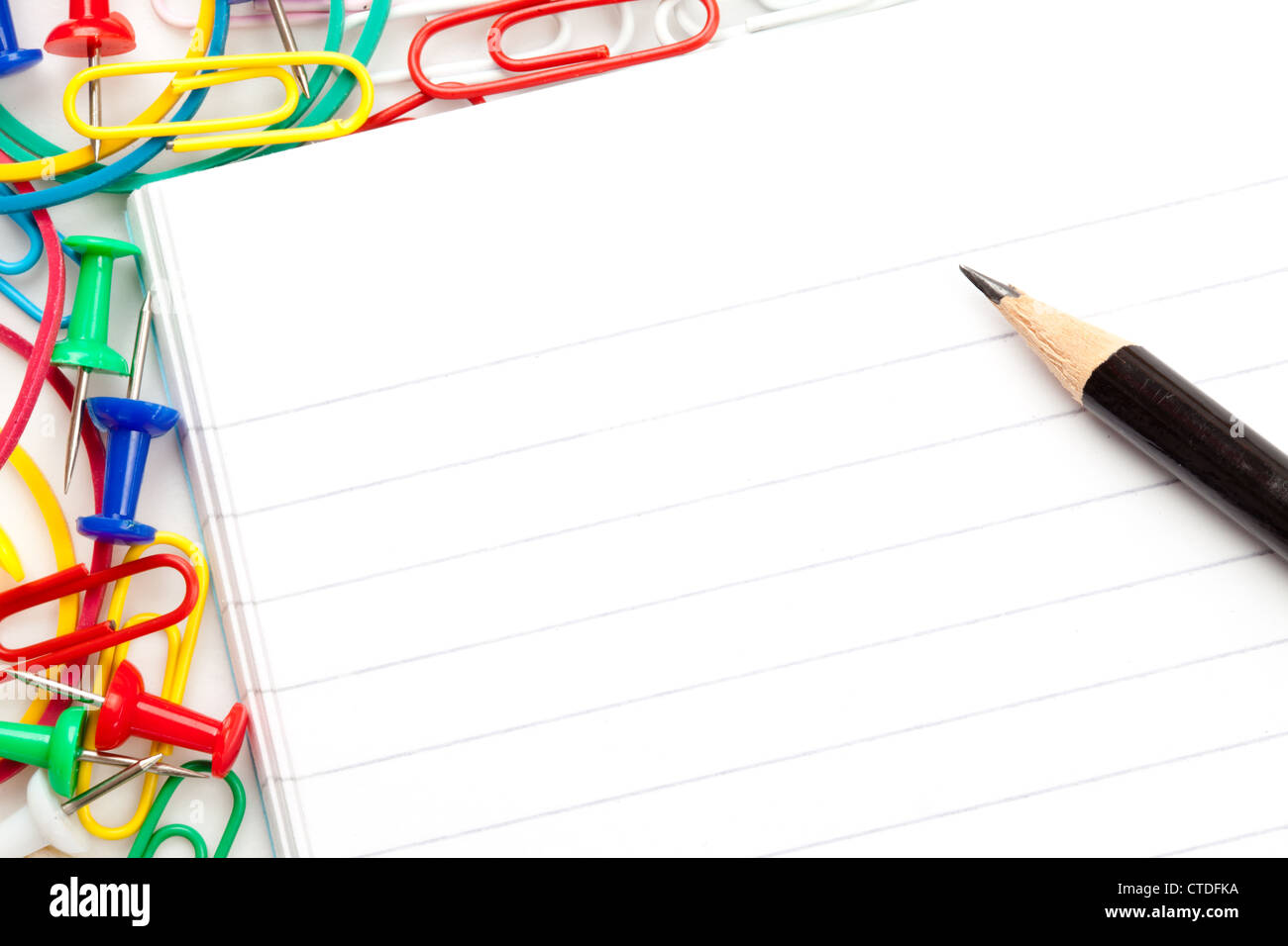 Notepad with large group of muti coloured stationery and a pencil Stock Photo