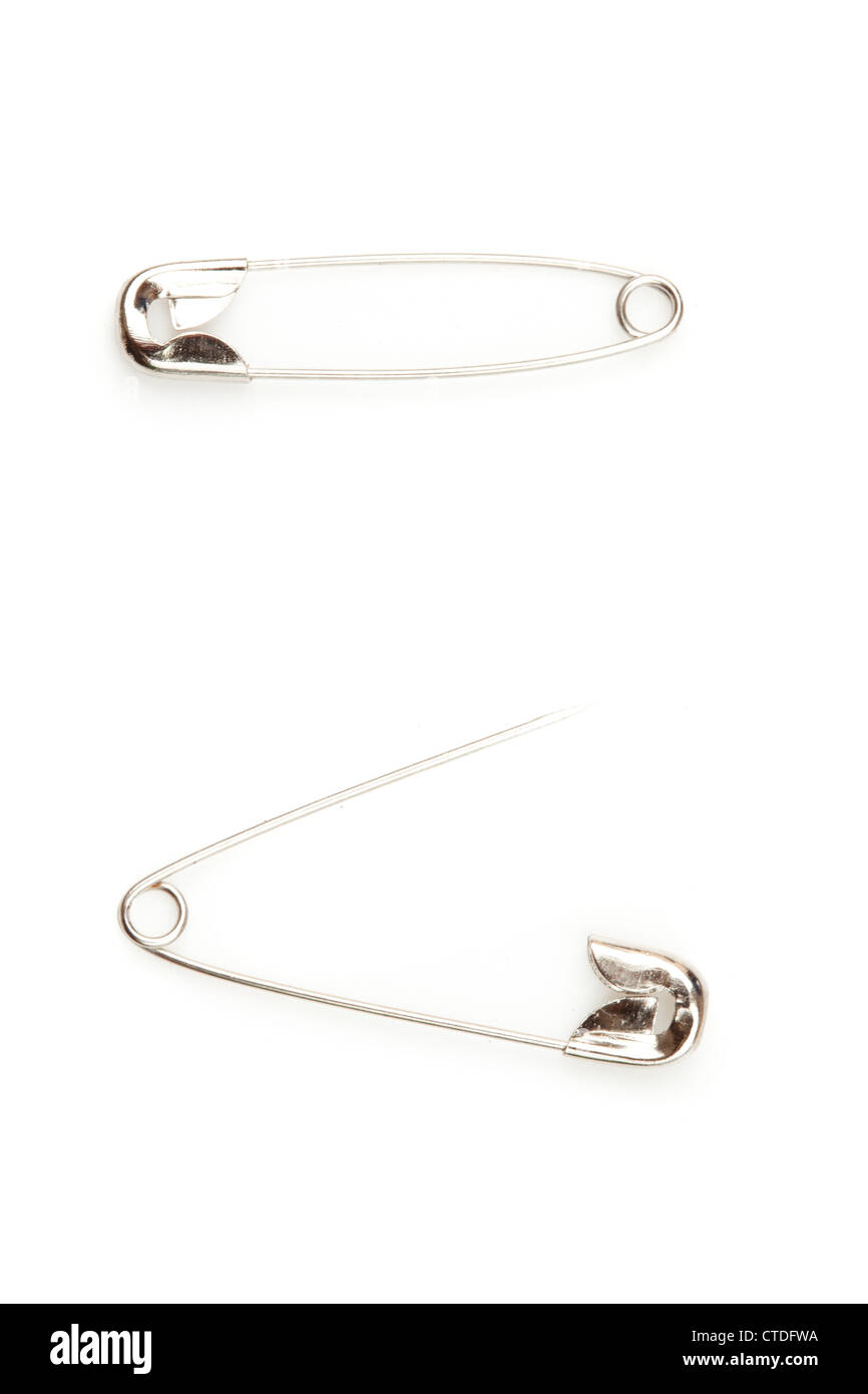 Two safety pin one opening an the other closing Stock Photo Alamy