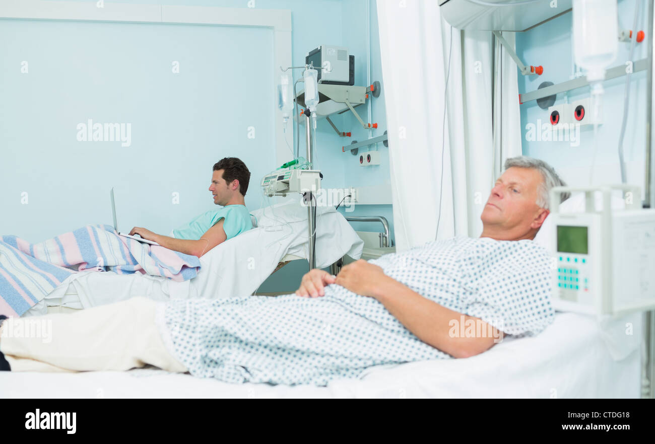 people in hospital beds