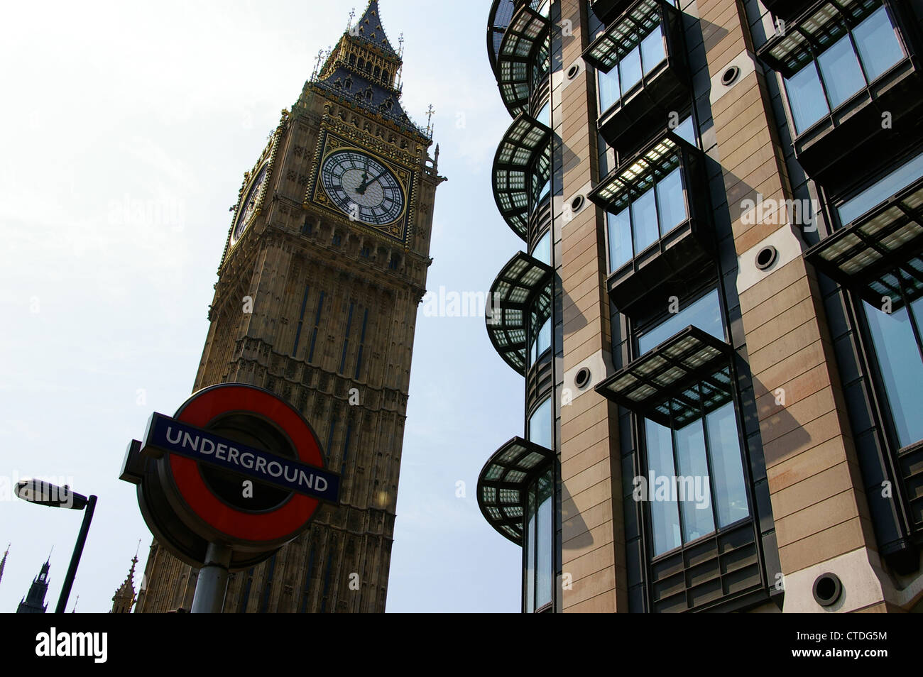 Big Ben, Portcullis House and Westminster tube station Stock Photo