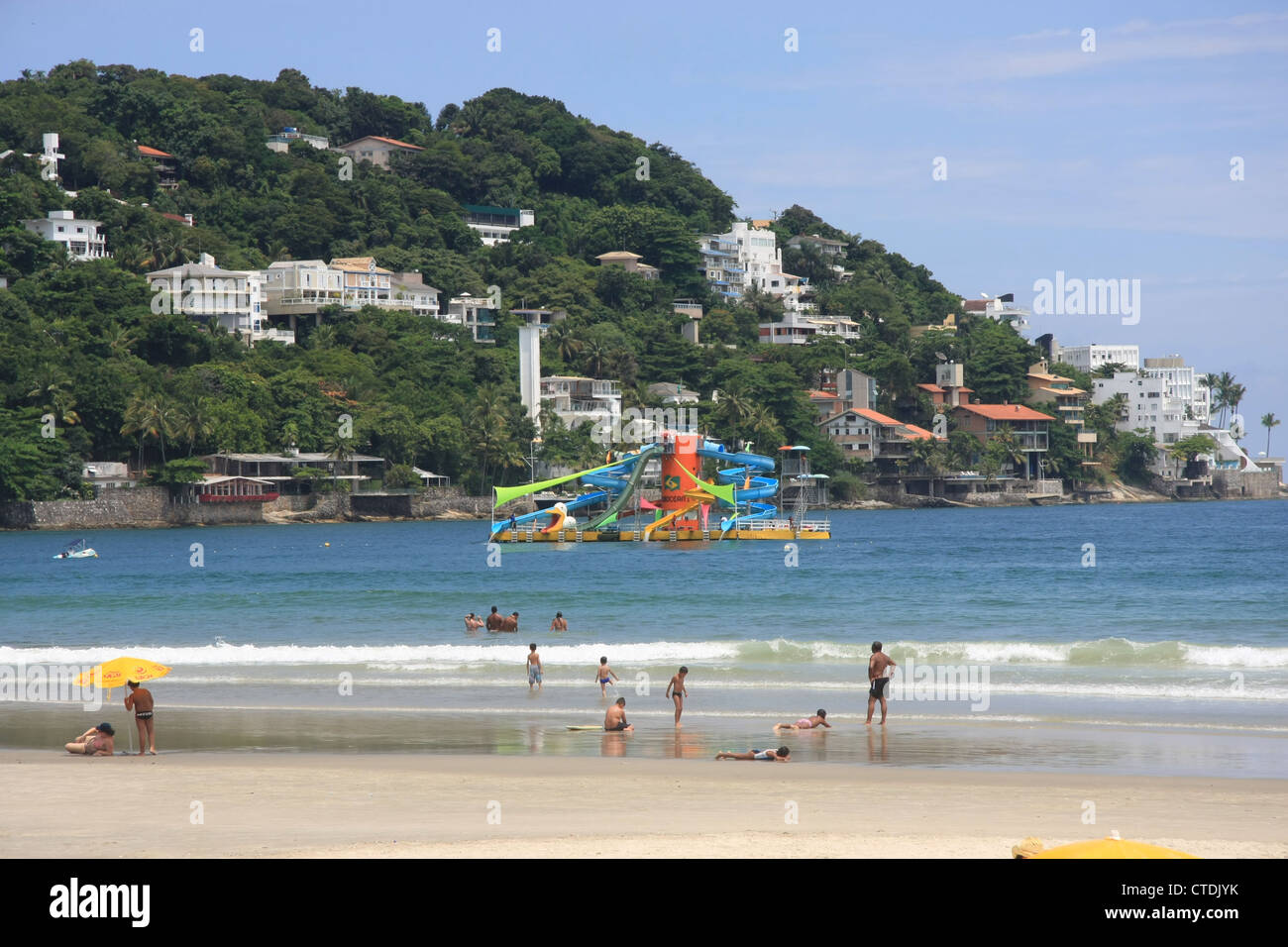 Beach and floating water park rides at Guaruja, Sao Paulo, Brazil Stock Photo