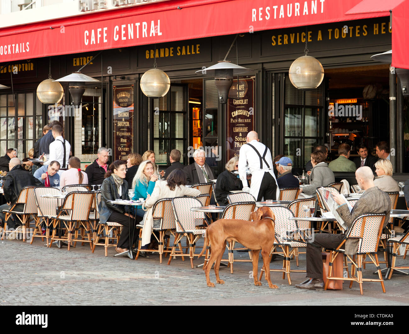 People having lunch outside Cafe Central on Rue Cler in the