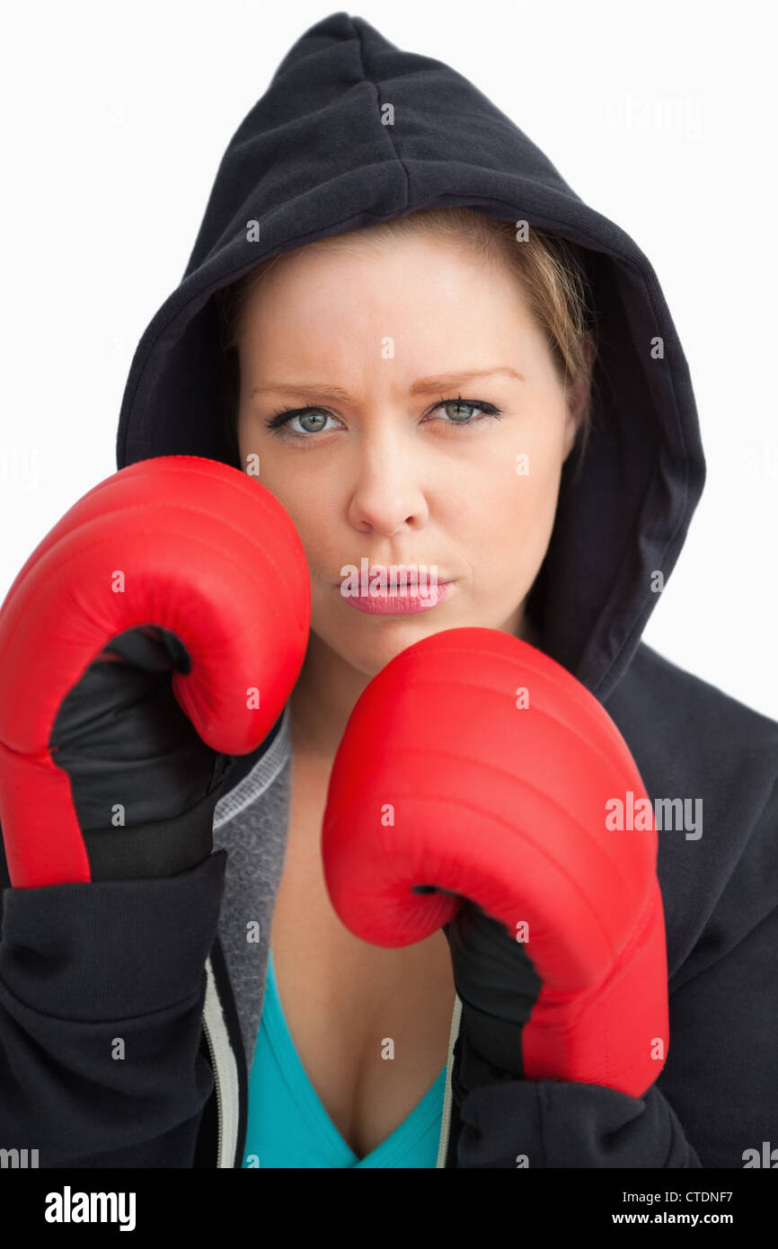 Woman showing her boxing gloves Stock Photo Alamy