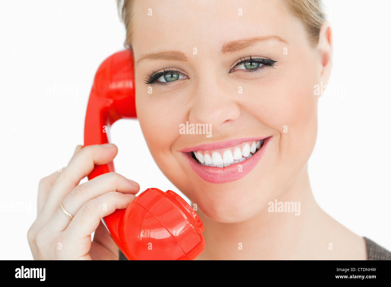 Woman using a retro phone Stock Photo