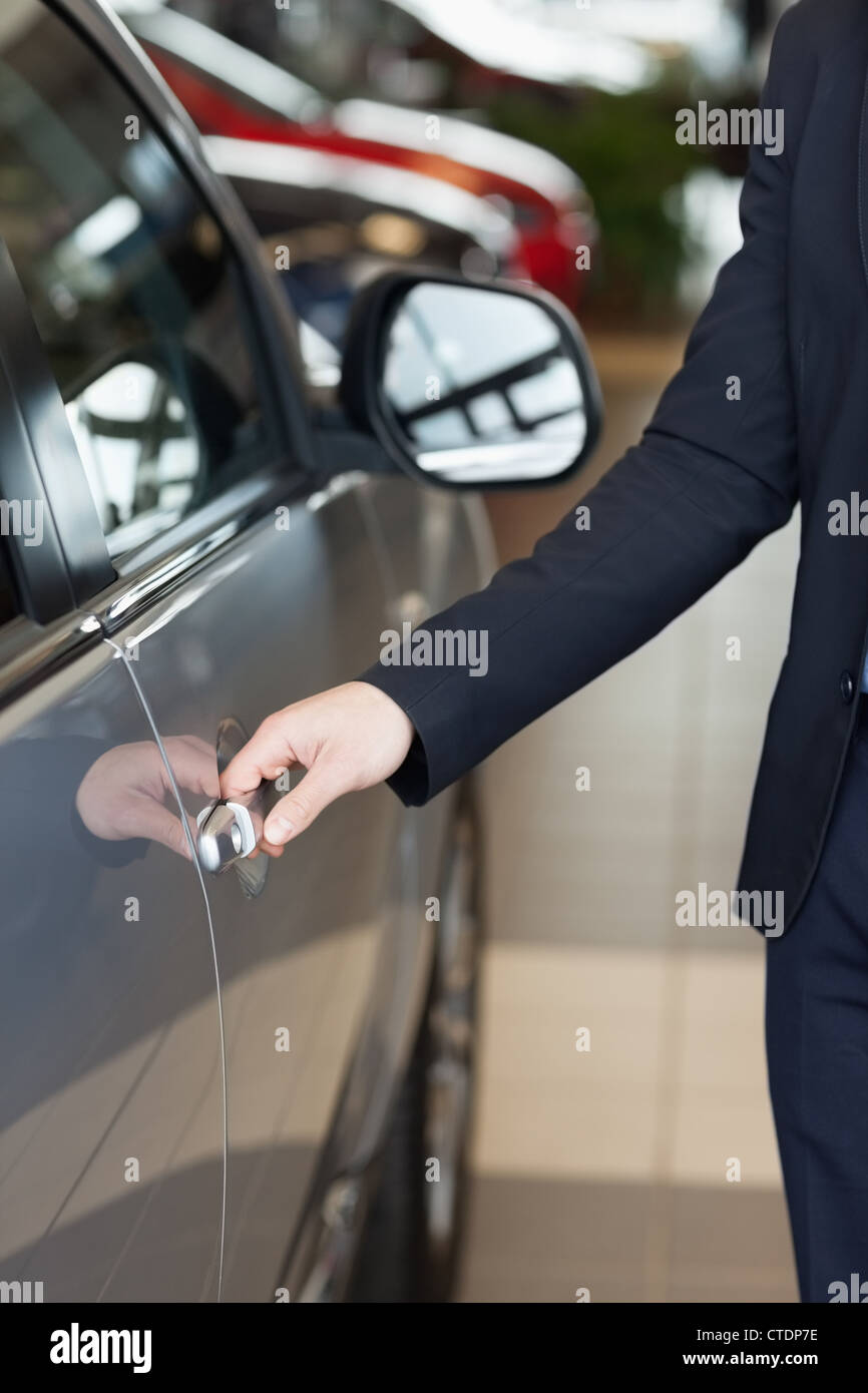 Man holding a car door handles Stock Photo Alamy