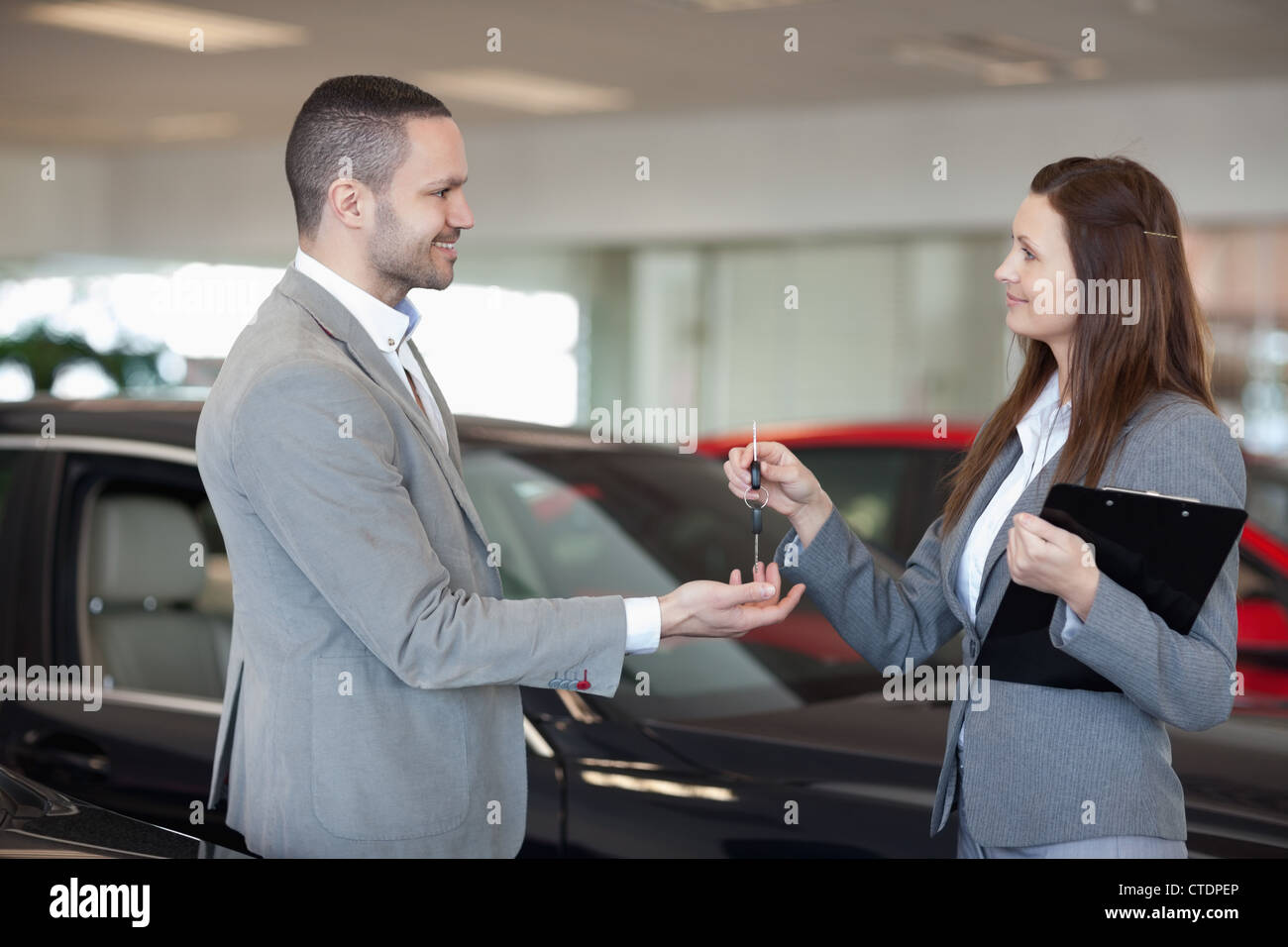 Man giving client keys hi-res stock photography and images - Alamy