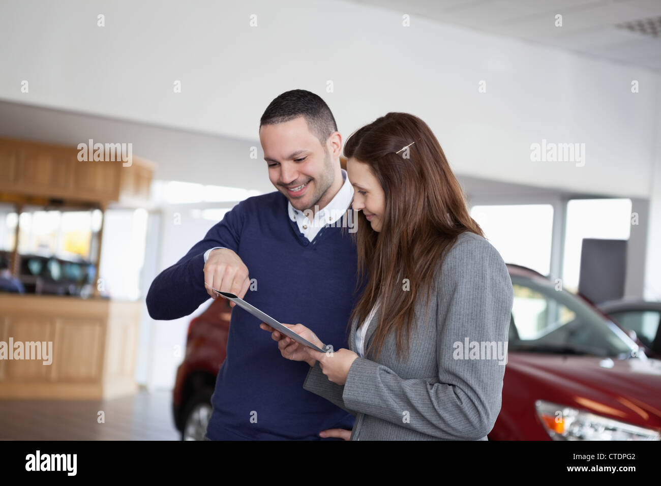 Man showing a file Stock Photo - Alamy
