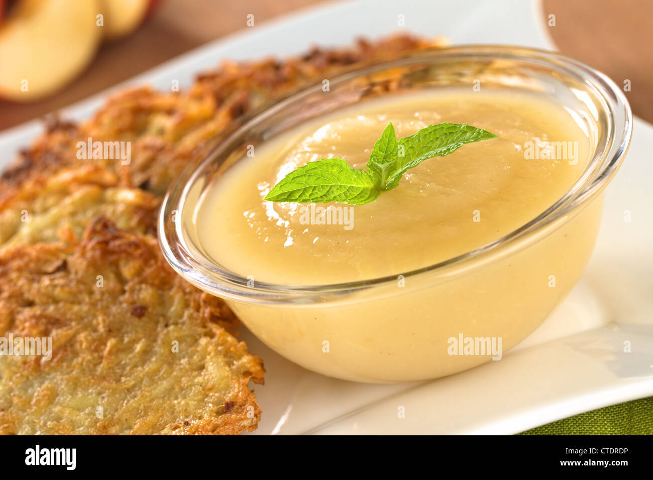Apple sauce with potato fritters, a traditional German dish (Selective