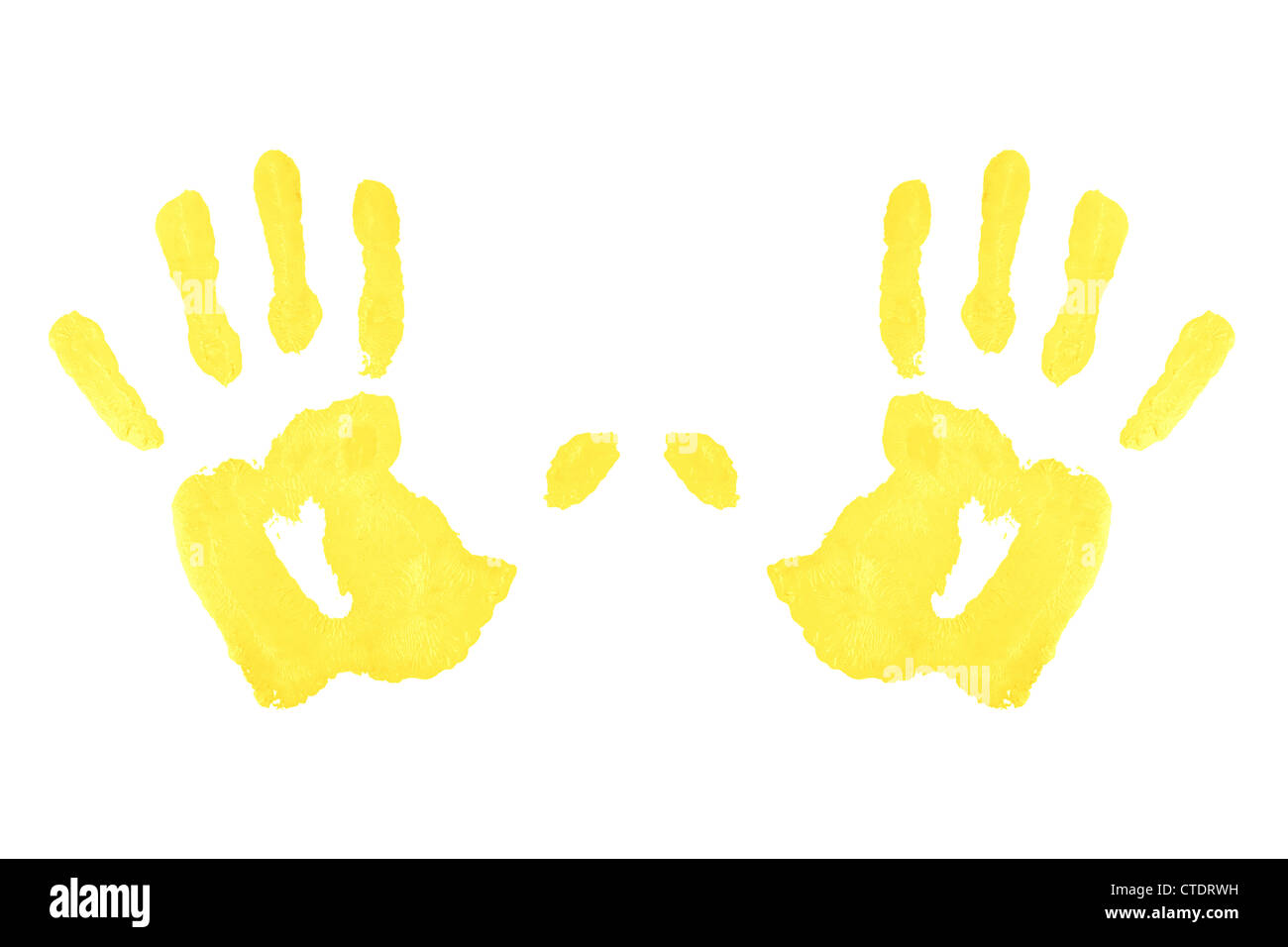 Two yellow symmetric handprints Stock Photo