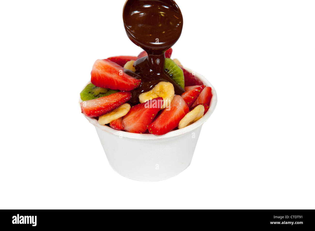 Fruit salad with chocolate sauce Stock Photo