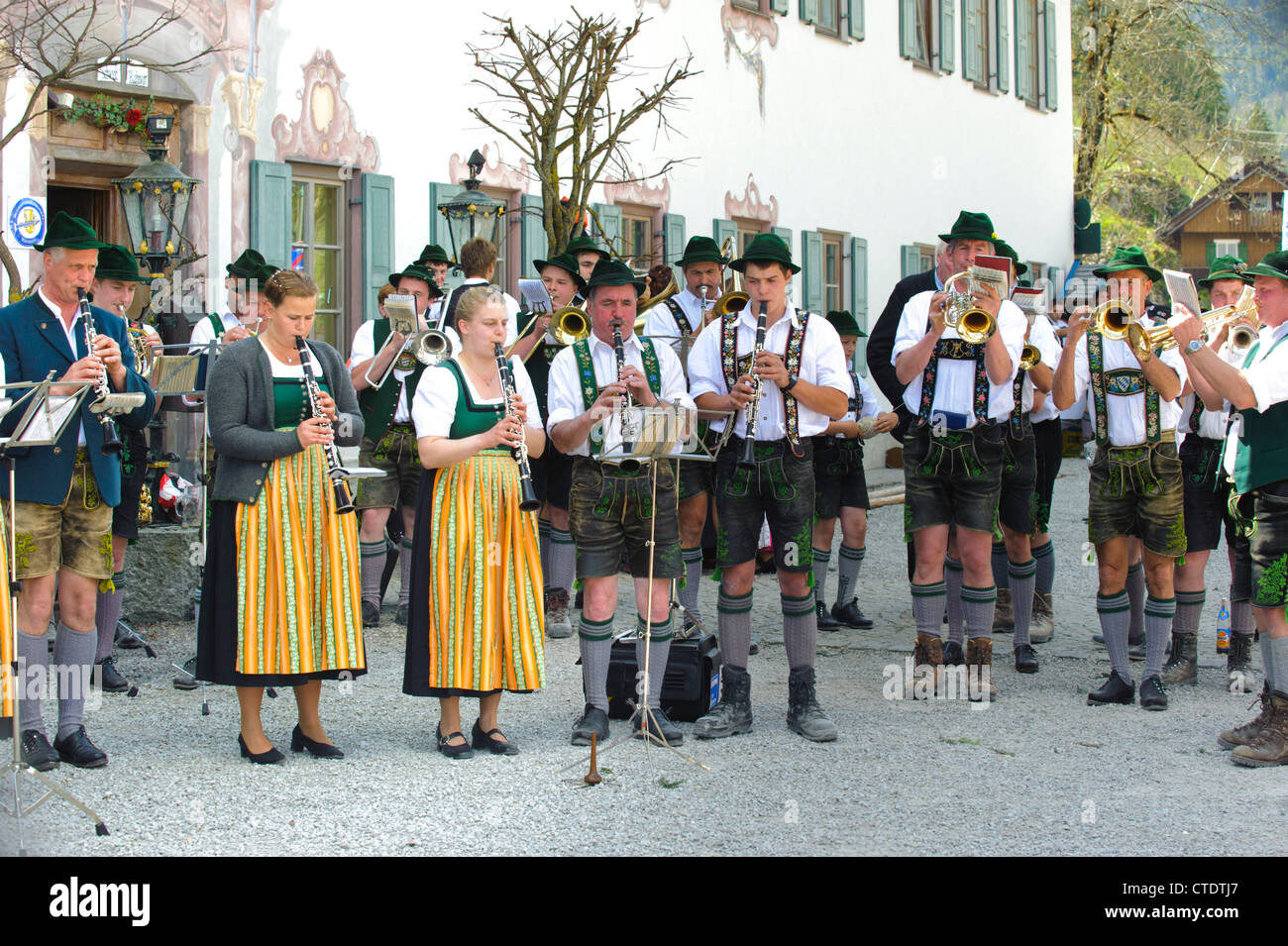 Musicians while an public event with trumpet in an traditional brass music band in Bavaria, Jachenau, Germany Stock Photo