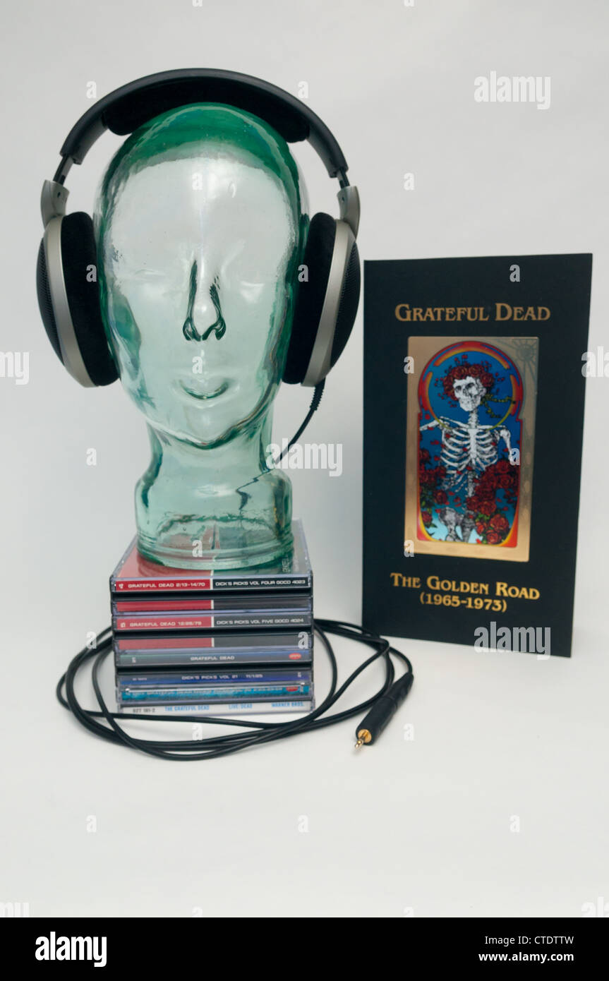 Glass head on a pile of Grateful Dead CD's with a box set Stock Photo