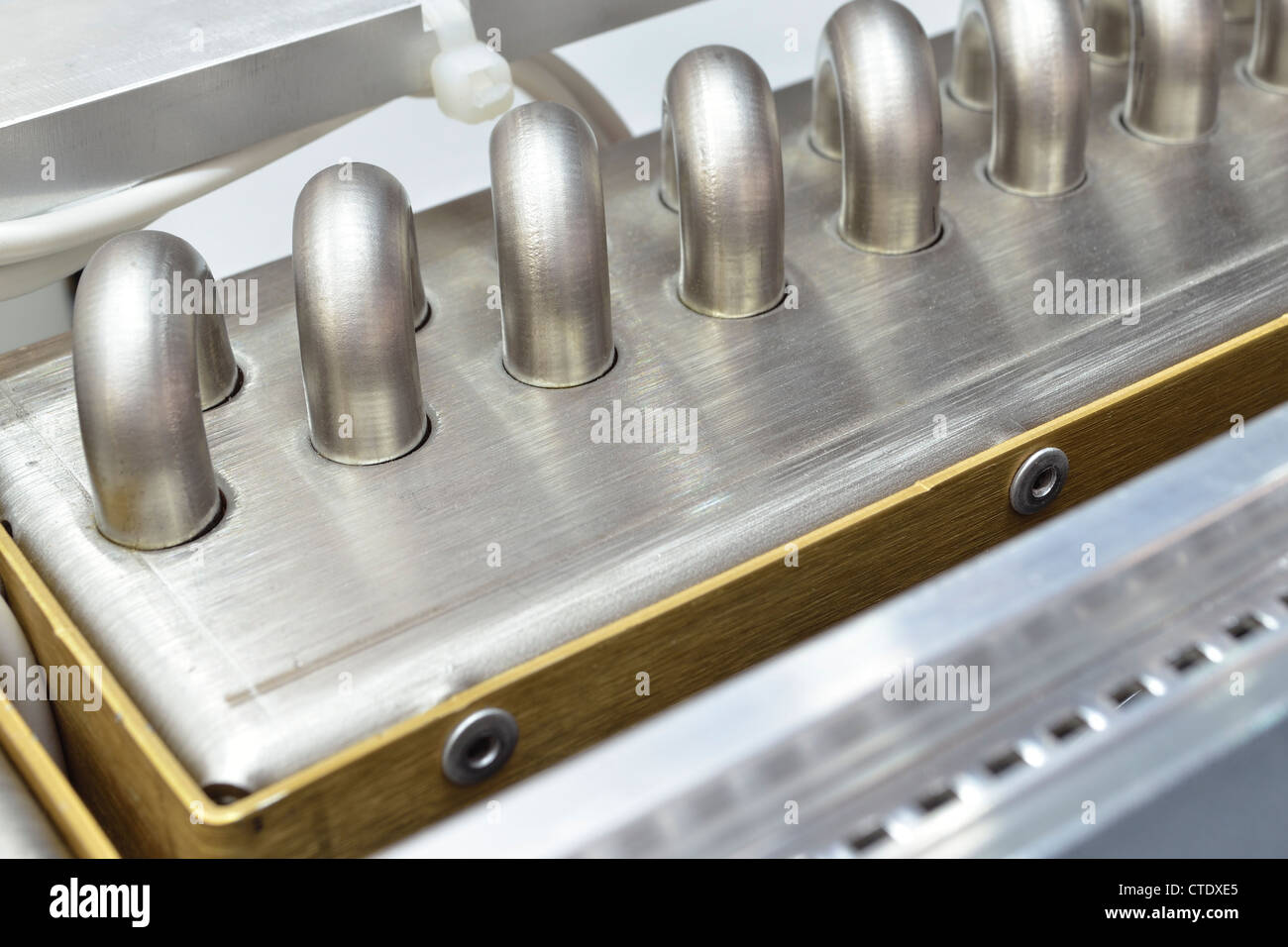 industrial cooling unit water-to-air heat exchanger fragment; shallow DOF Stock Photo