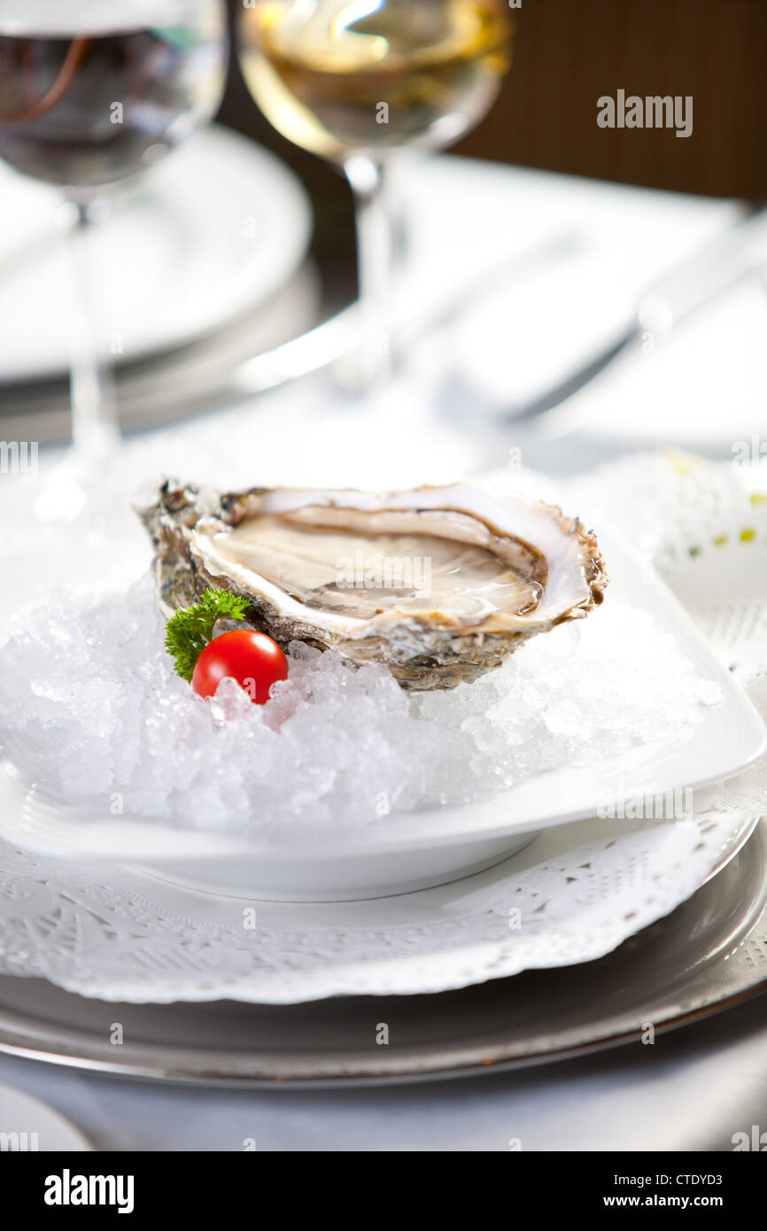 Oysters on ice, close-up photo, small dof Stock Photo