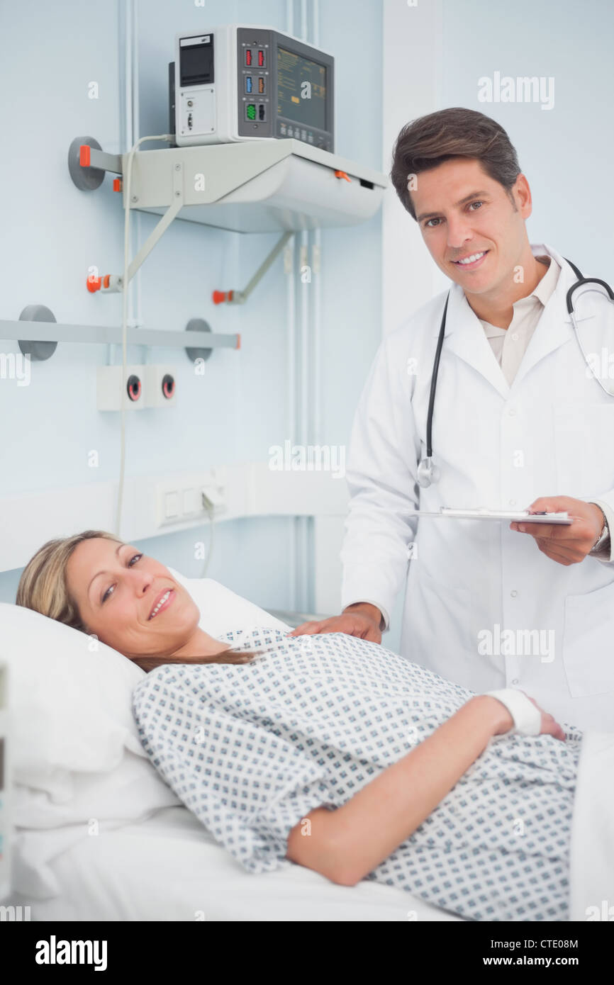 Doctor and patient smiling Stock Photo
