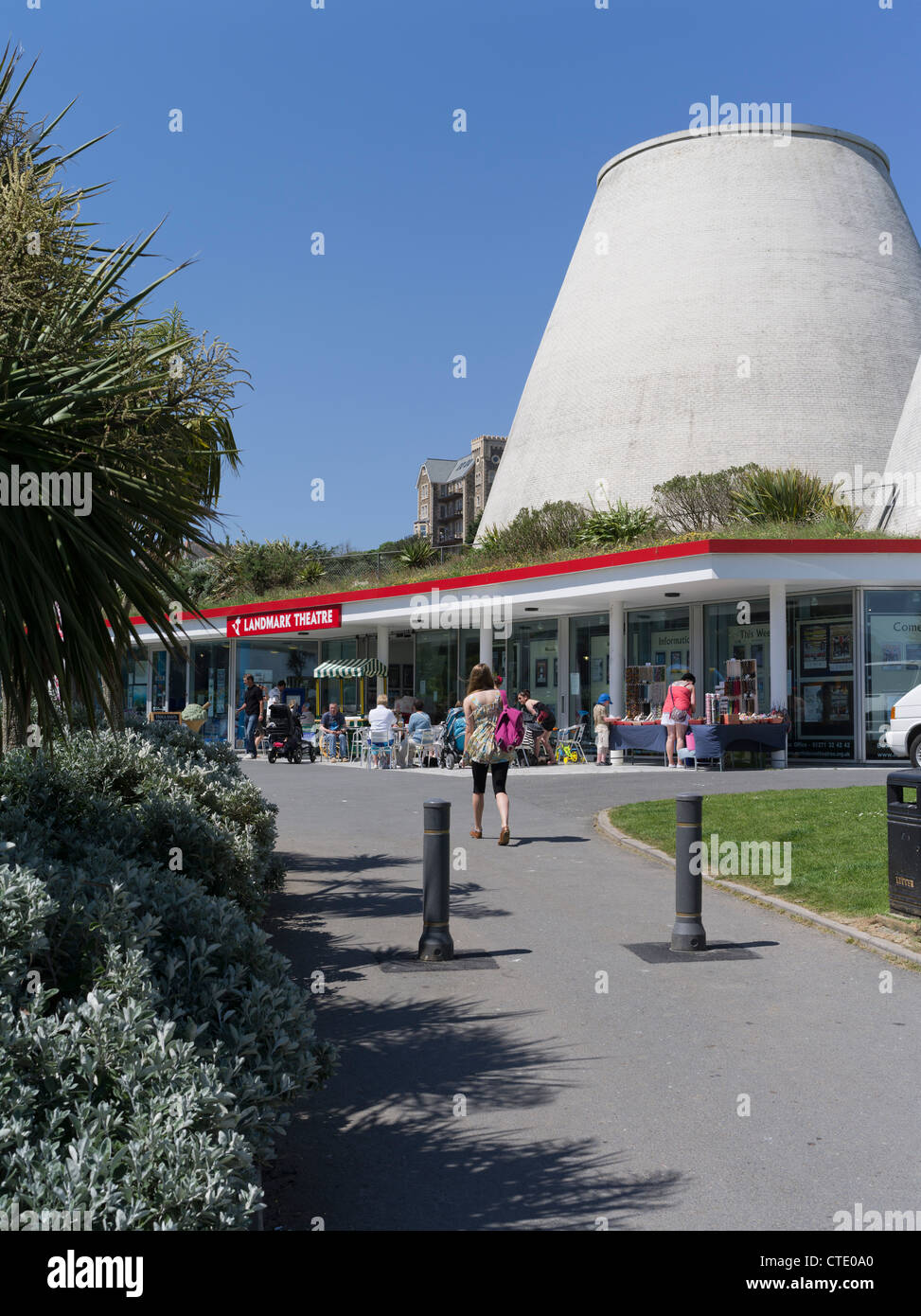 dh Landmark theatre ILFRACOMBE DEVON North Devonshire girl cafe shops outdoor day holiday tourists Stock Photo
