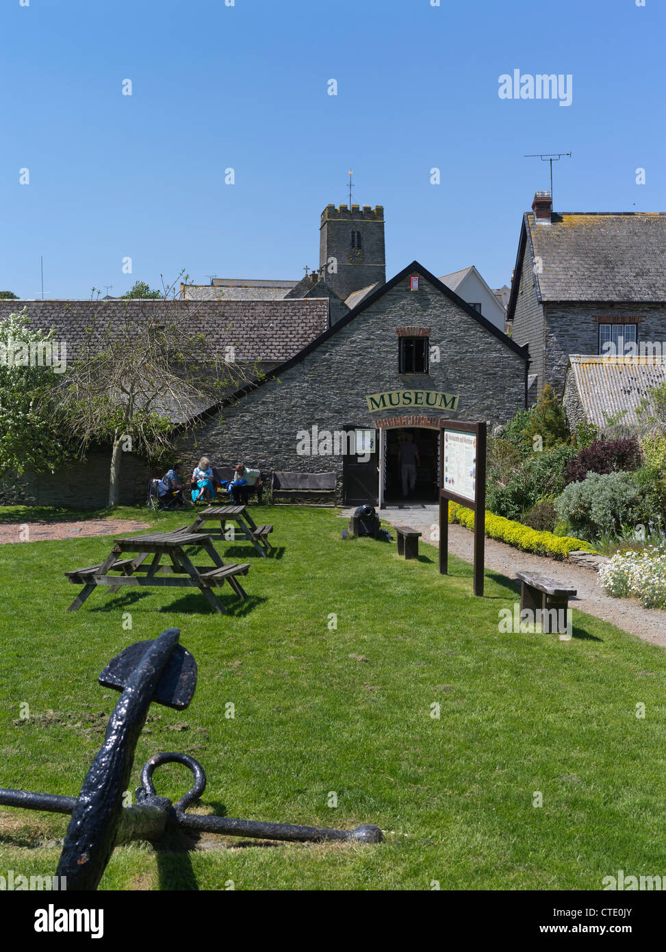 dh National trust museum MORTEHOE DEVON Tourist sitting outside museum building Heritage Centre visitors holiday tourists uk Stock Photo