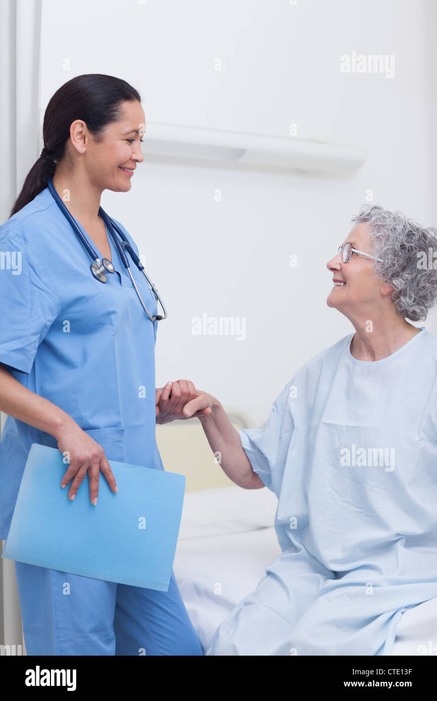 Elderly black patient bed hi-res stock photography and images - Alamy