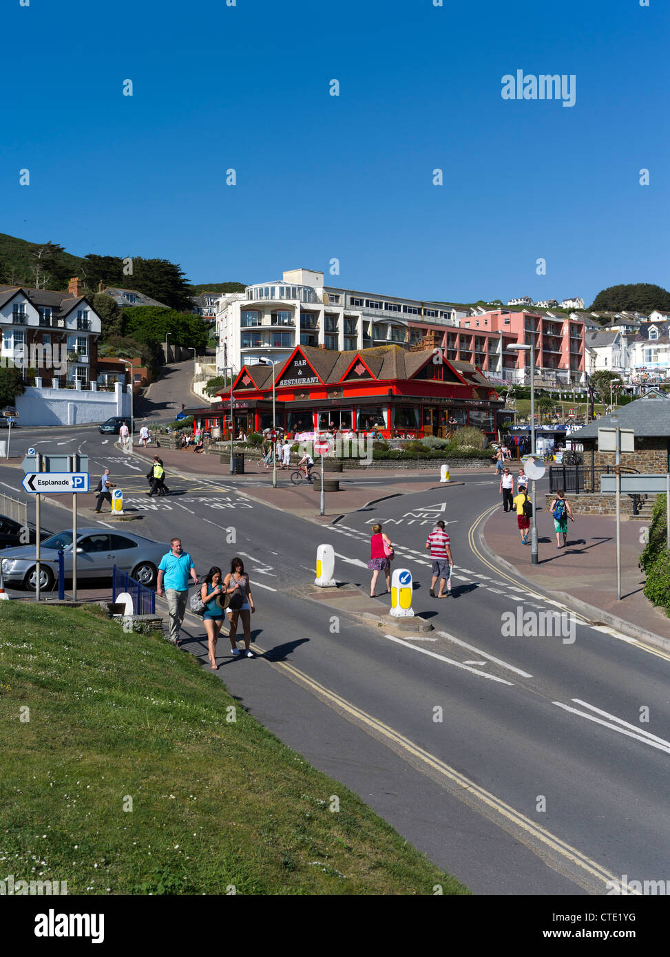 dh Red barn restaurant WOOLACOMBE DEVON Tourists apartments seaside resort people summer holiday british Stock Photo