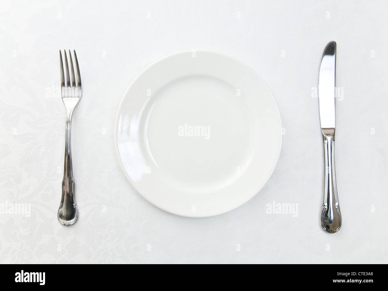 Plate and silverware Stock Photo Alamy