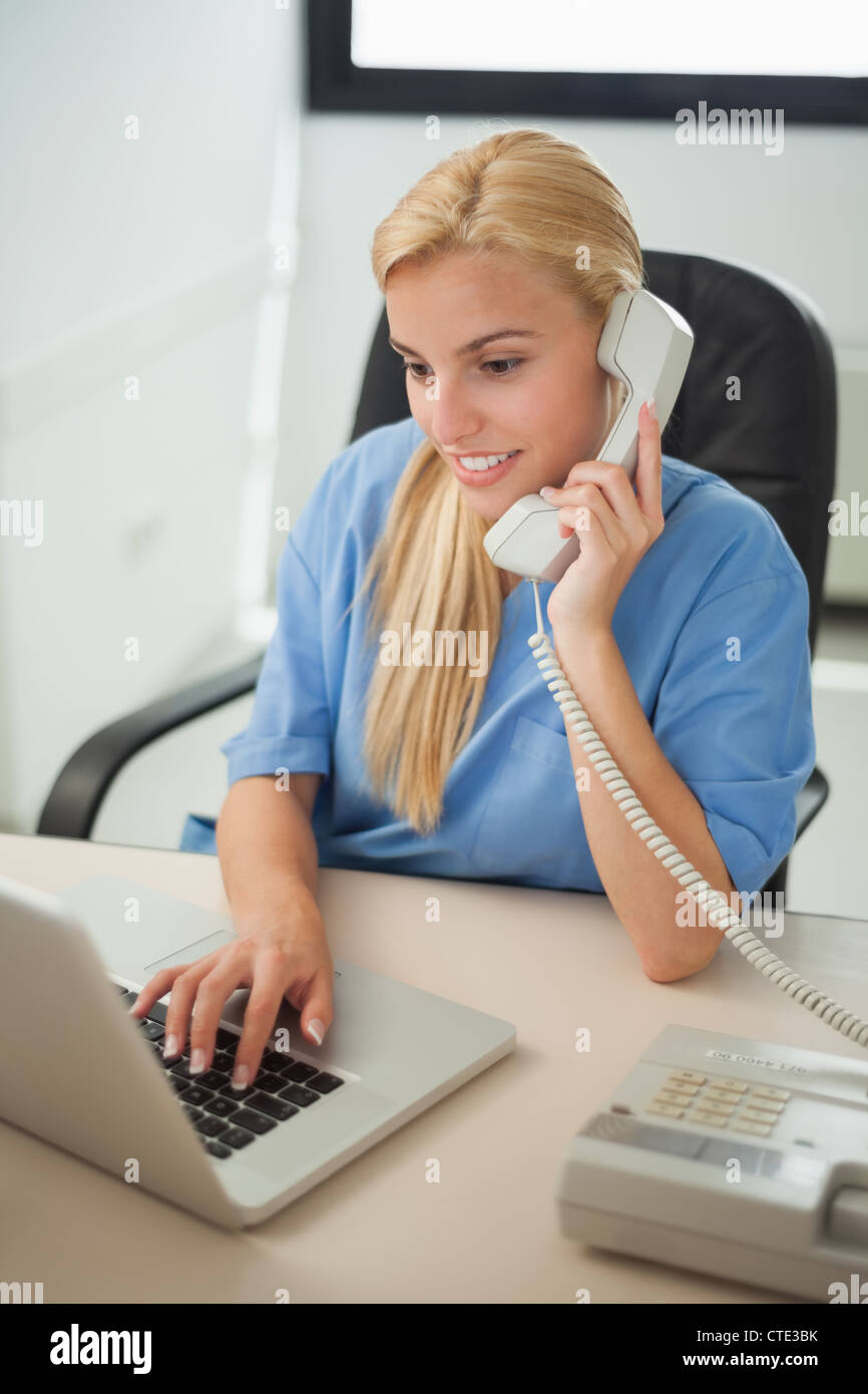 Nurse typing hi-res stock photography and images - Alamy