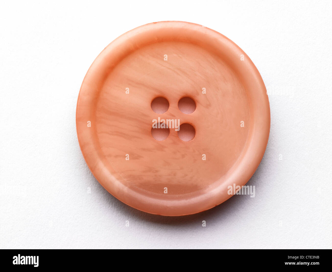 A pink button Stock Photo