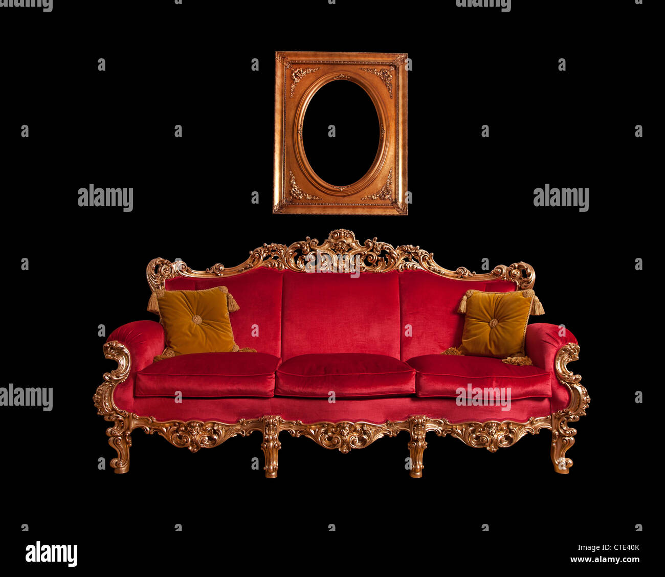 Red baroque sofa, isolated Stock Photo