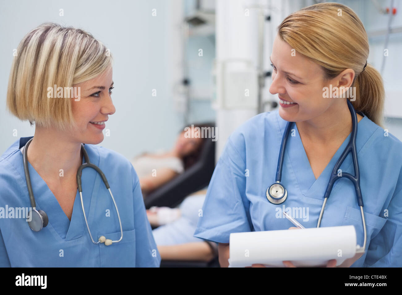 Smiling nurses talking Stock Photo