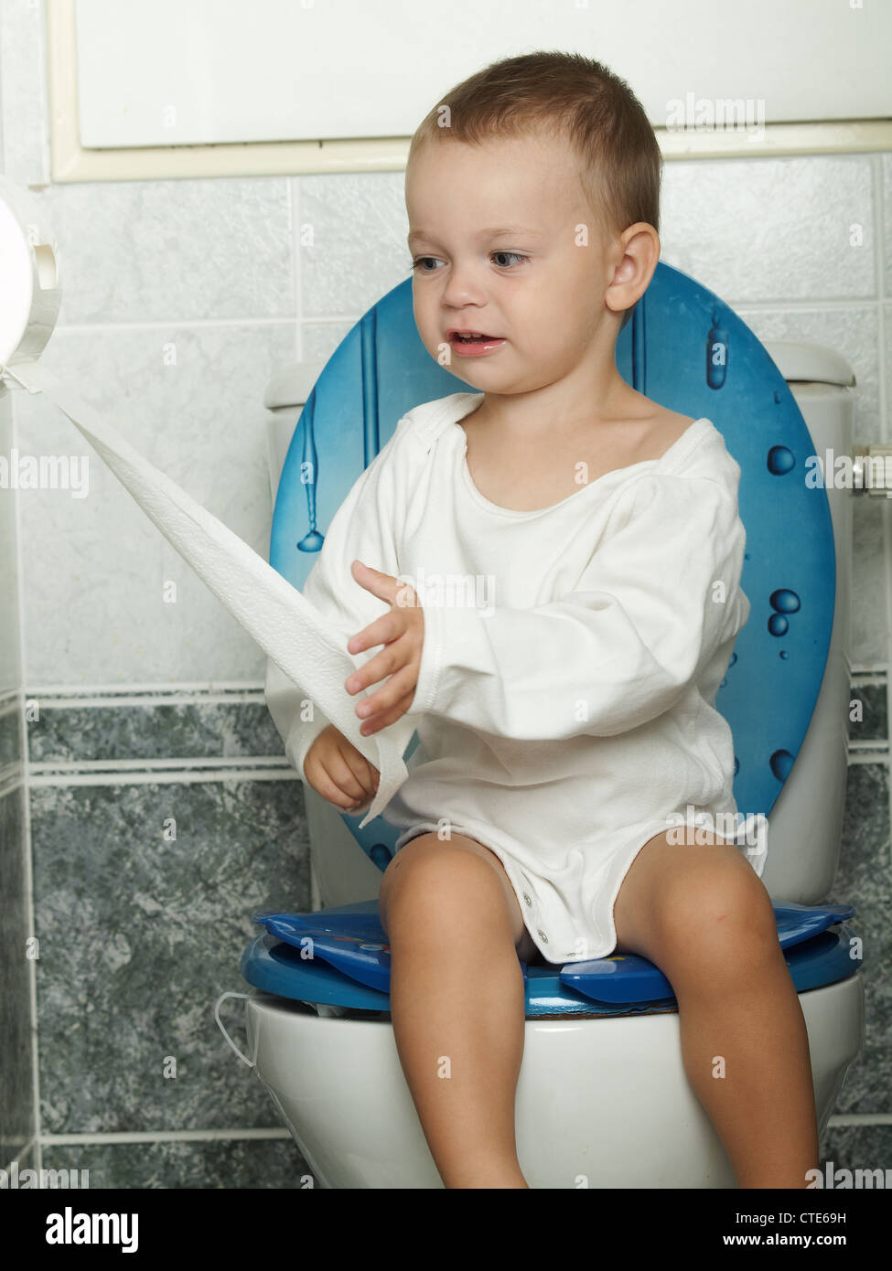 Little boy on toilet Stock Photo Alamy
