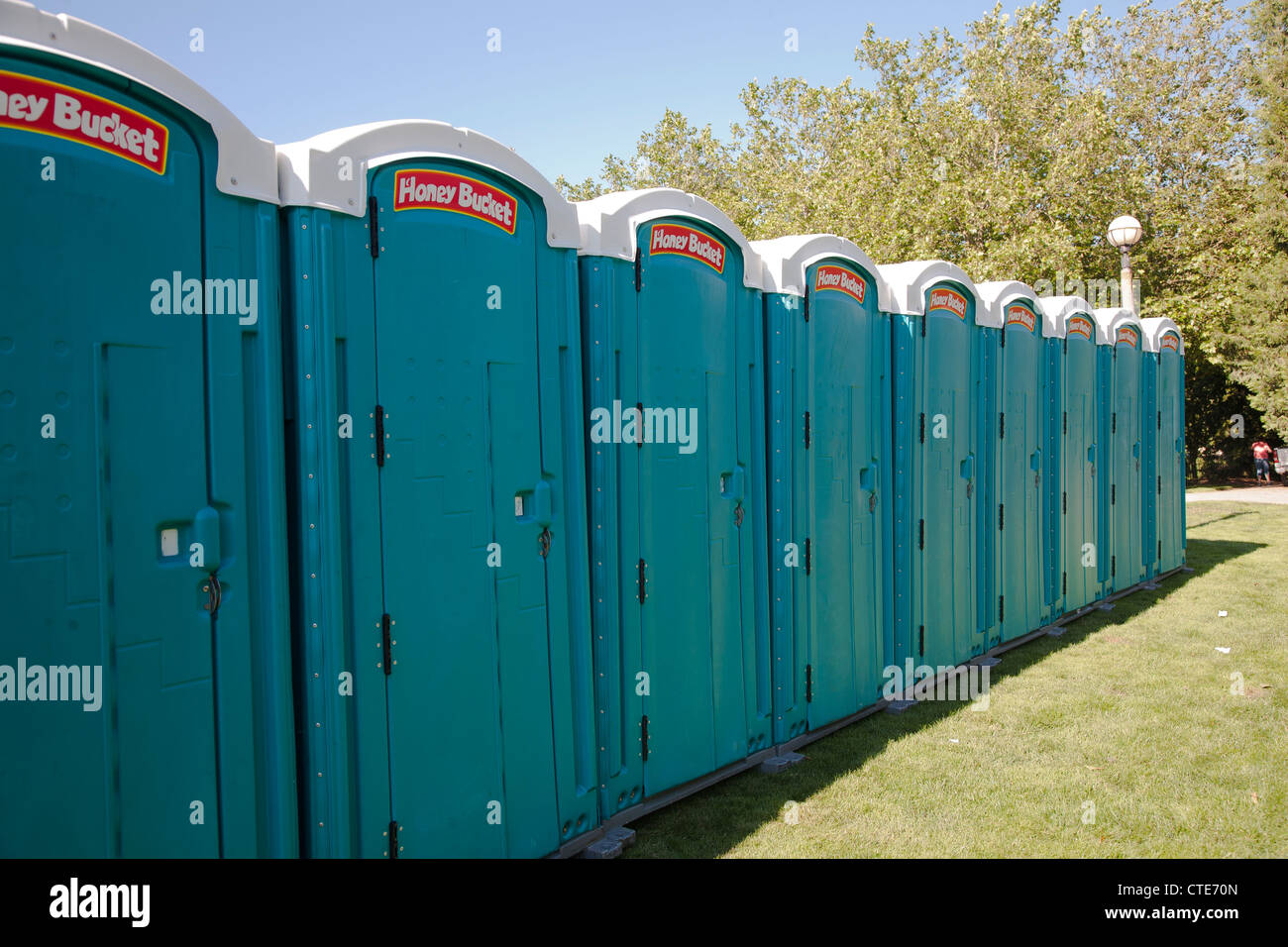 Row of  cubicles with green doors at a summer fair in Bellevue Washington State USA Stock Photo