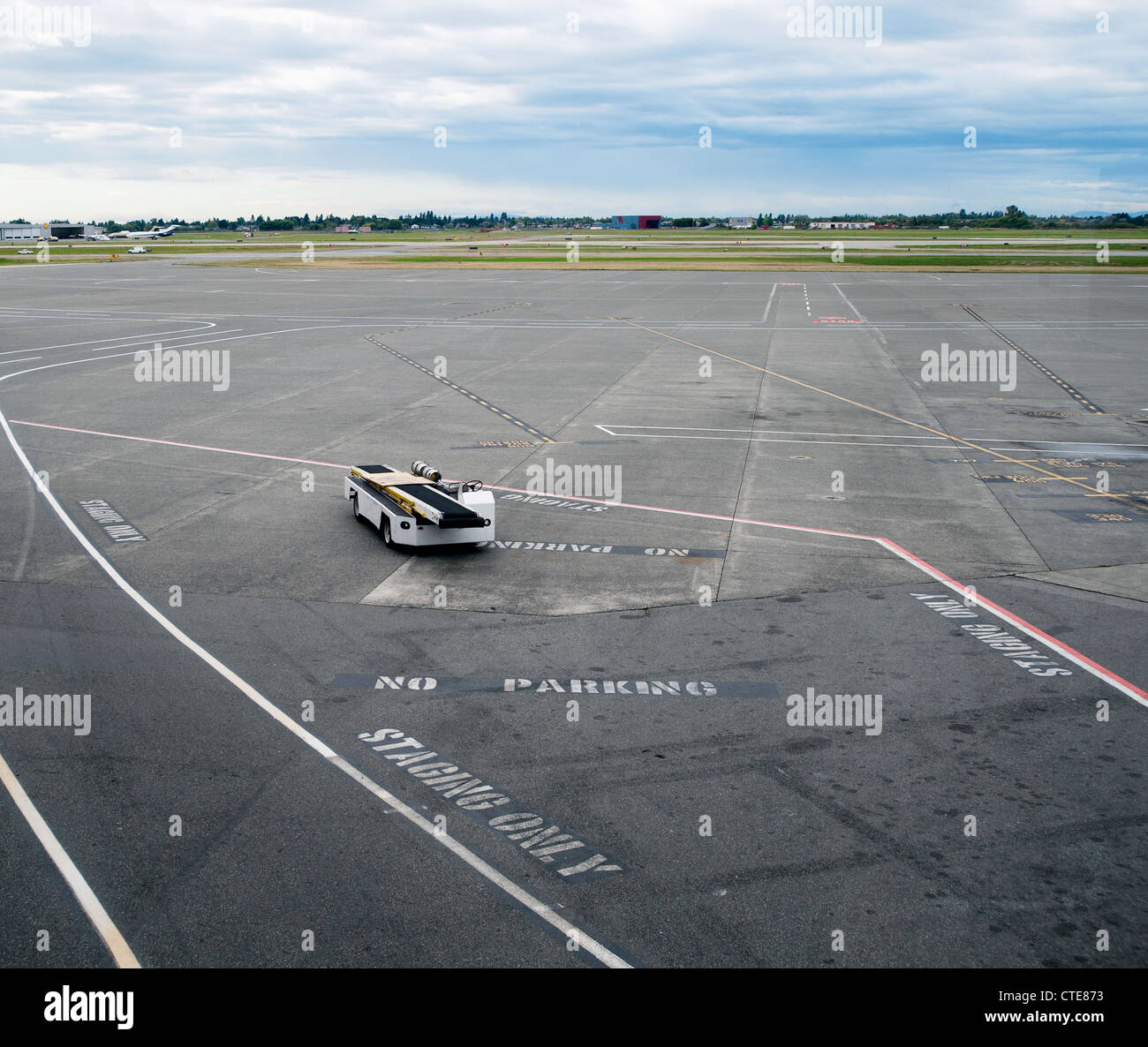 View from above. The airport apron, tarmac, marked out areas, for service vehicles. Airside. Stock Photo