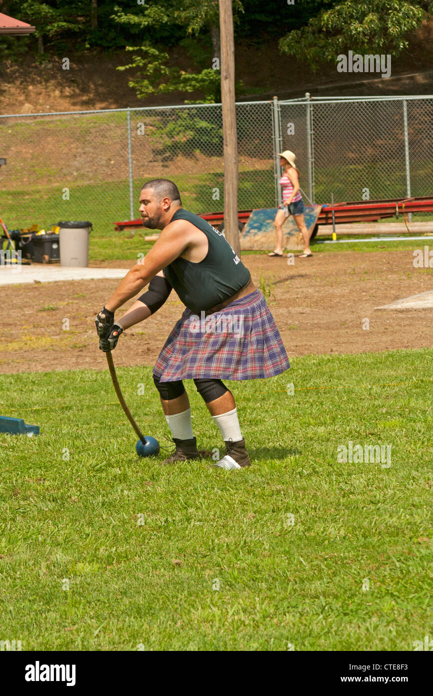 contestant in hammer throw event Scottish Highland Festival, Blairsville Georgia USA Stock Photo