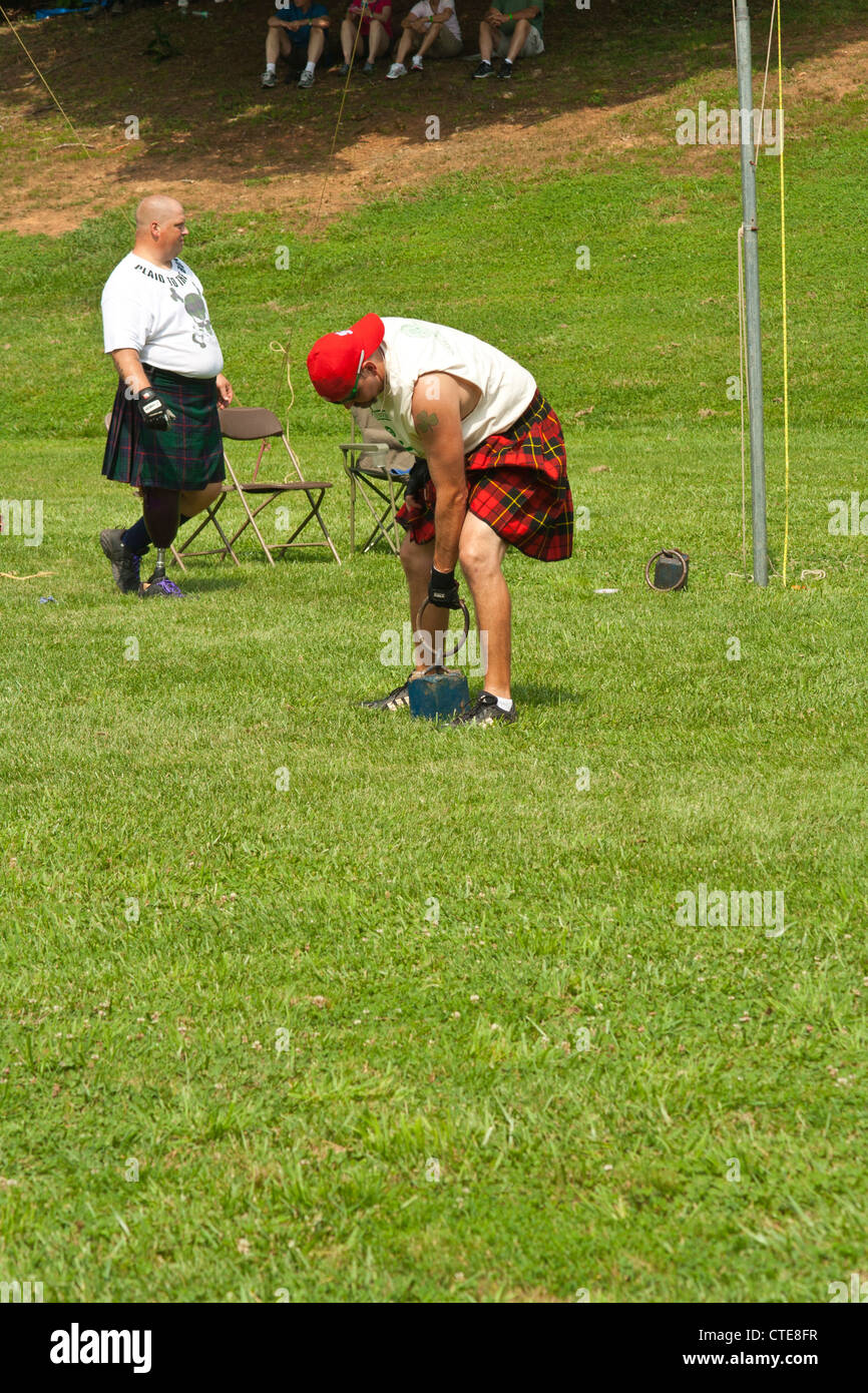 contestant in weight throw event Scottish Highland Festival, Blairsville Georgia USA Stock Photo