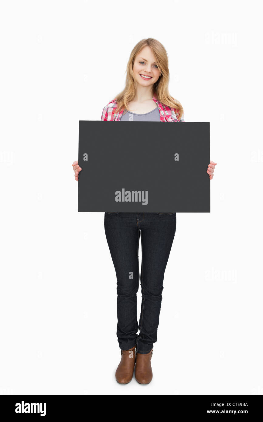 Woman holding a black board Stock Photo