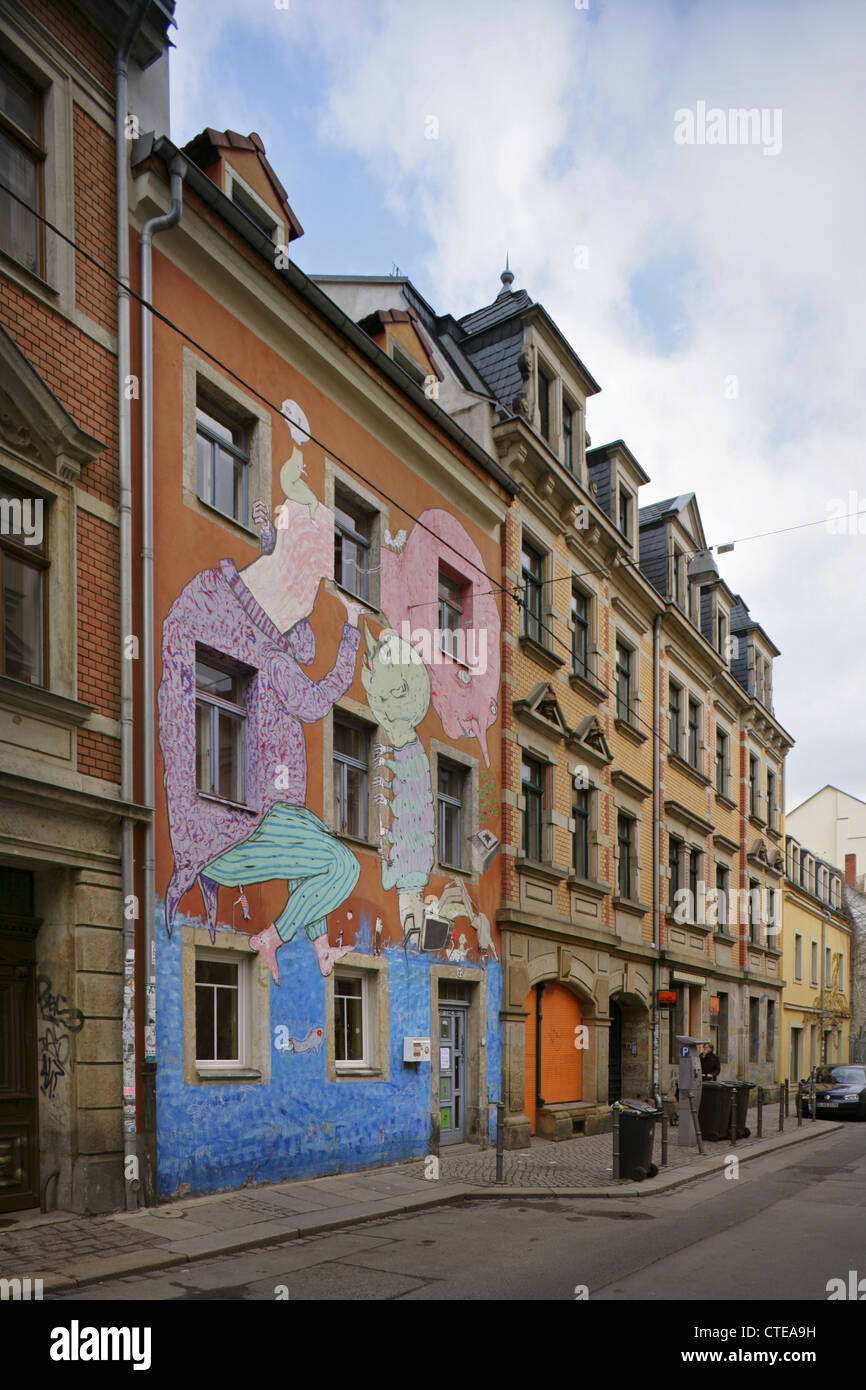 Apartment building with graffiti facade in the Neustadt, Dresden