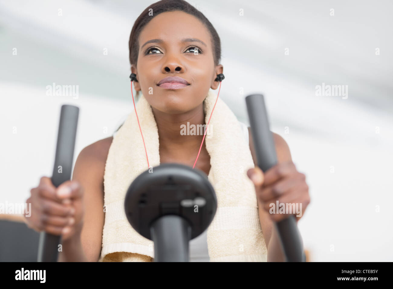 Low angle view of a black woman doing exercise bike Stock Photo