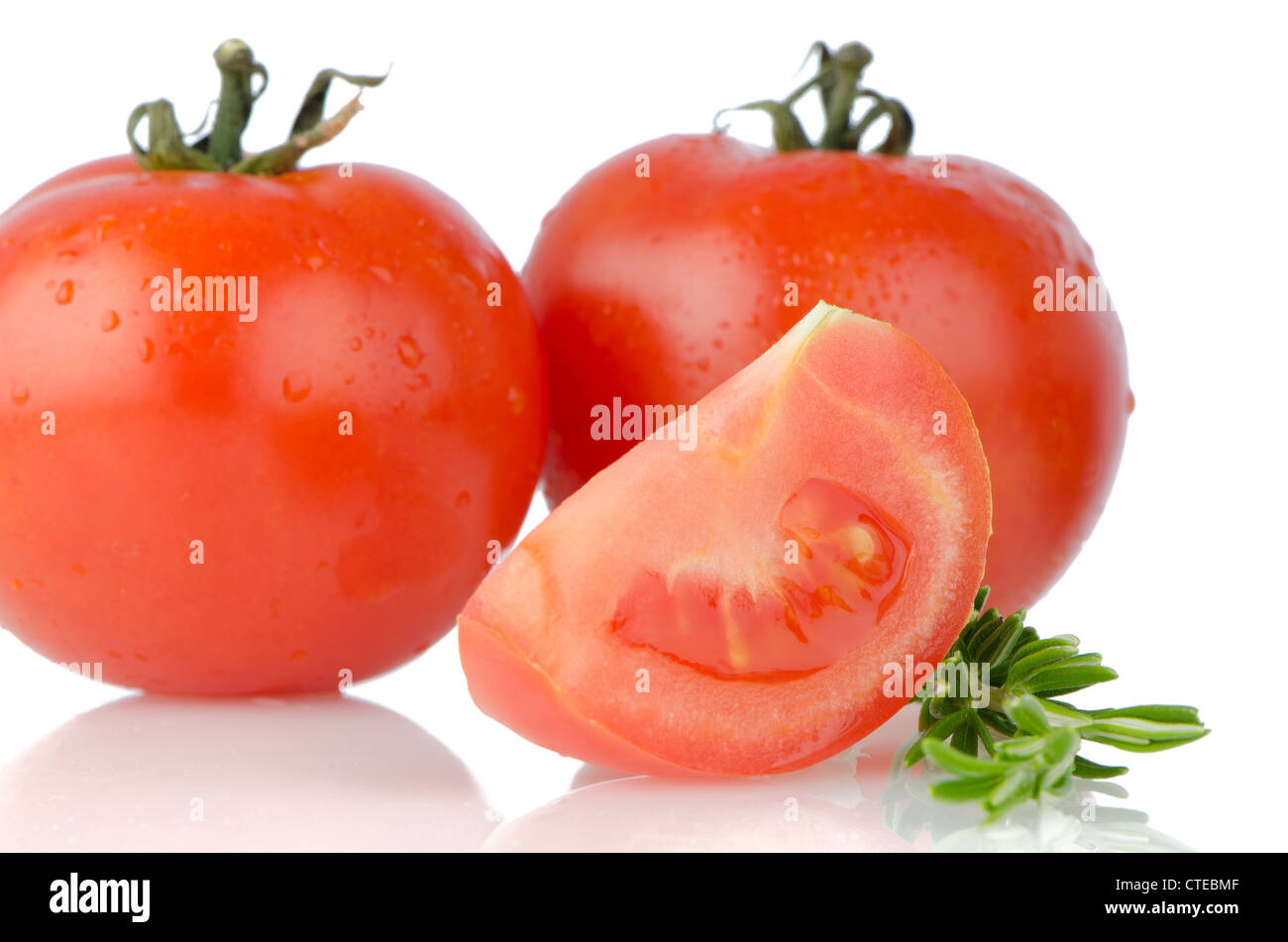 Red tomatoes isolated on white background Stock Photo - Alamy