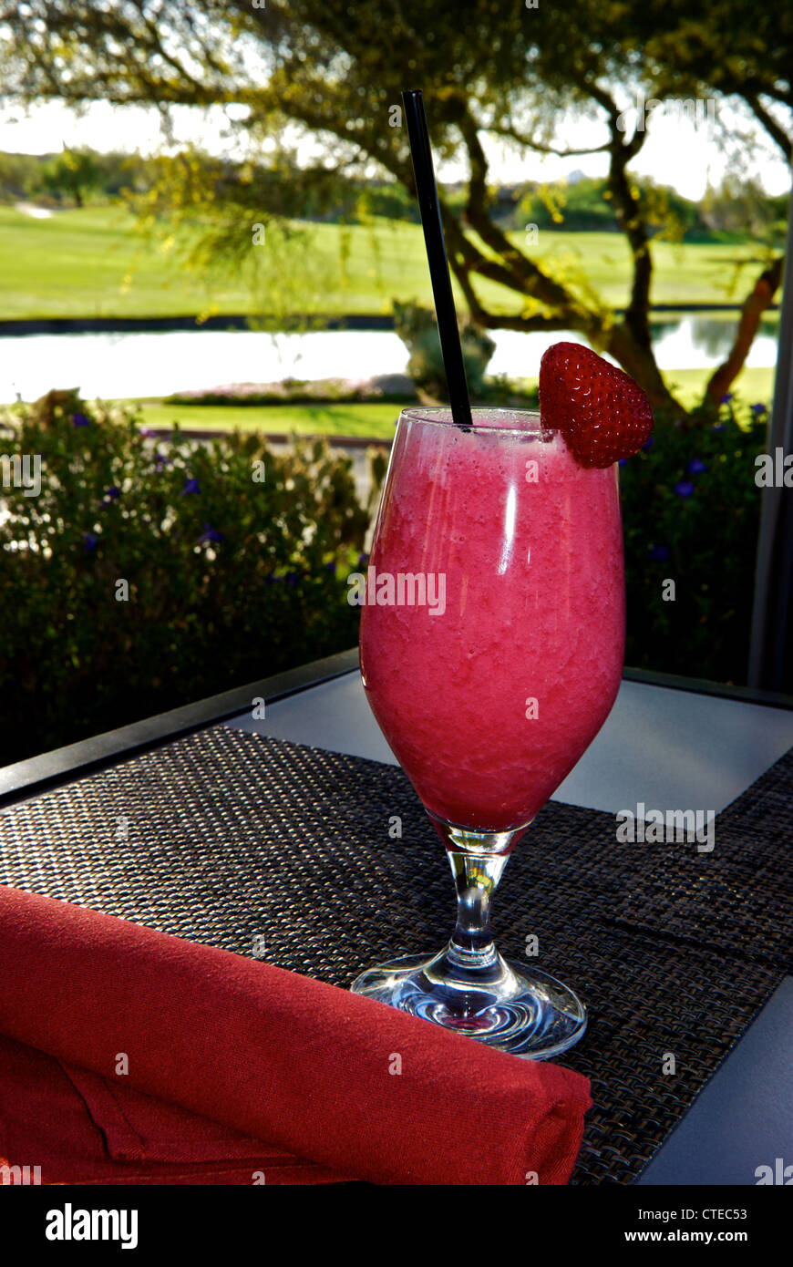 Tall strawberry fruit breakfast smoothie Palo Verde restaurant Boulders Resort Scottsdale AZ Stock Photo