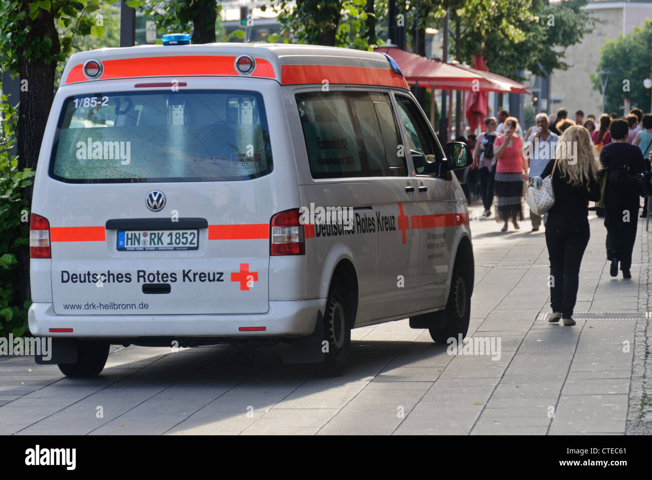 Ambulance Van "Deutsches Rotes Kreuz" "German Red Cross" on sidewalk pavement - Heilbronn Germany Europe Stock Photo