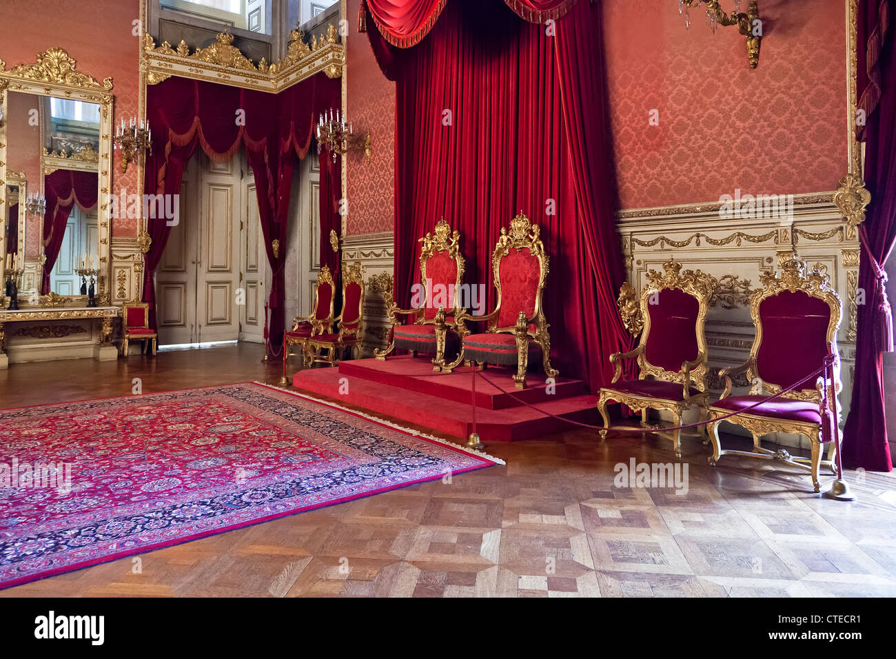 Throne Room of the Ajuda National Palace, Lisbon, Portugal. 19th century neoclassical Royal palace / throne thrones Throne Thrones king queen red Stock Photo