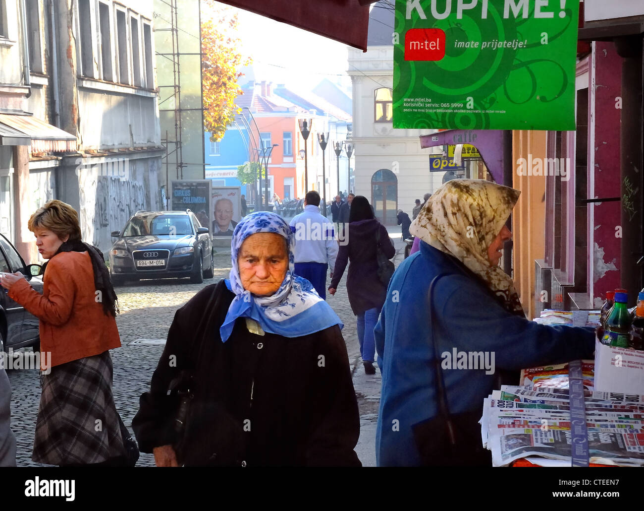 Bosnia, Tuzla : an old woman in a city street. Stock Photo