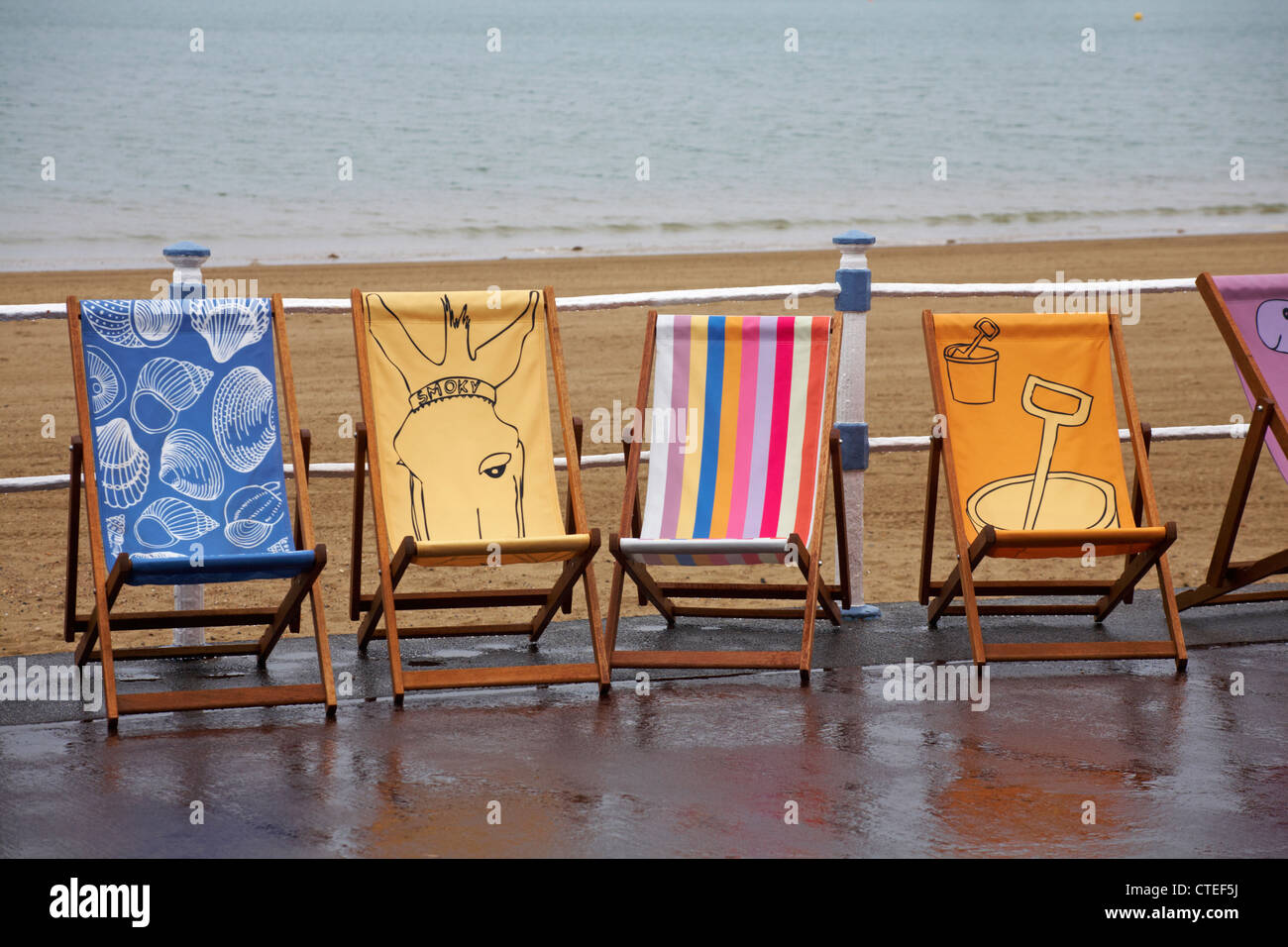 Weymouth Esplanade is decorated with 500 deckchairs, deck chairs