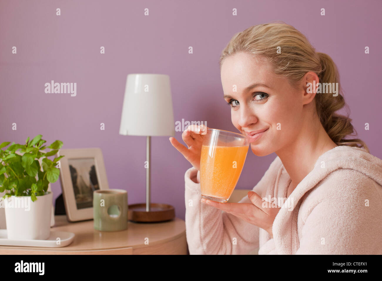 Woman with vitamin drink Stock Photo