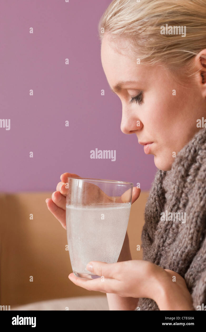 Woman drinking aspirin Stock Photo Alamy